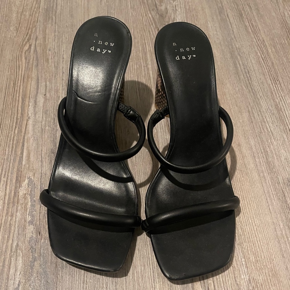 Black square toe with chunky snakeskin heel